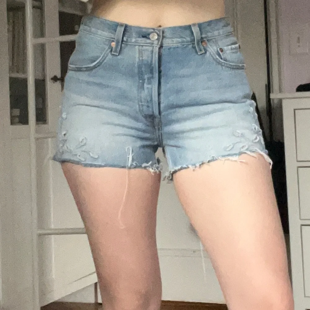 Cutest Light Wash Cutoff Levi’s Shorts With Floral Eyelet Detail! - Picture 1 of 12